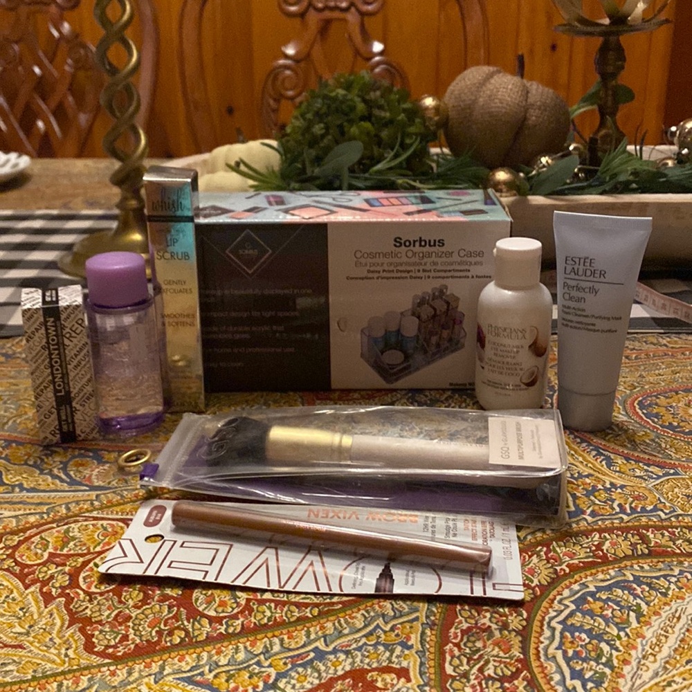 Sorbus cosmetic organizer with various products to go in it.